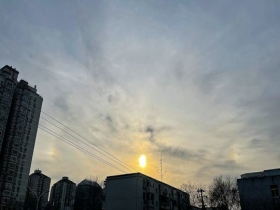 美！北京出现日晕幻日景观