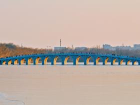 颐和园十七孔桥再迎金光穿洞 为冬日增添一抹亮色