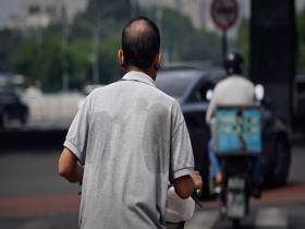 北京雨后湿漉漉 桑拿天威力不减