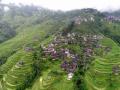 吊脚木楼与梯田在雨后演绎绝美景色（摄影：龚普康）