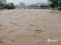 图为20日，湄江蒙山县城段洪水湍急。（图/陆宗海）